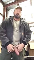 beefy Texas rancher stroking his meat