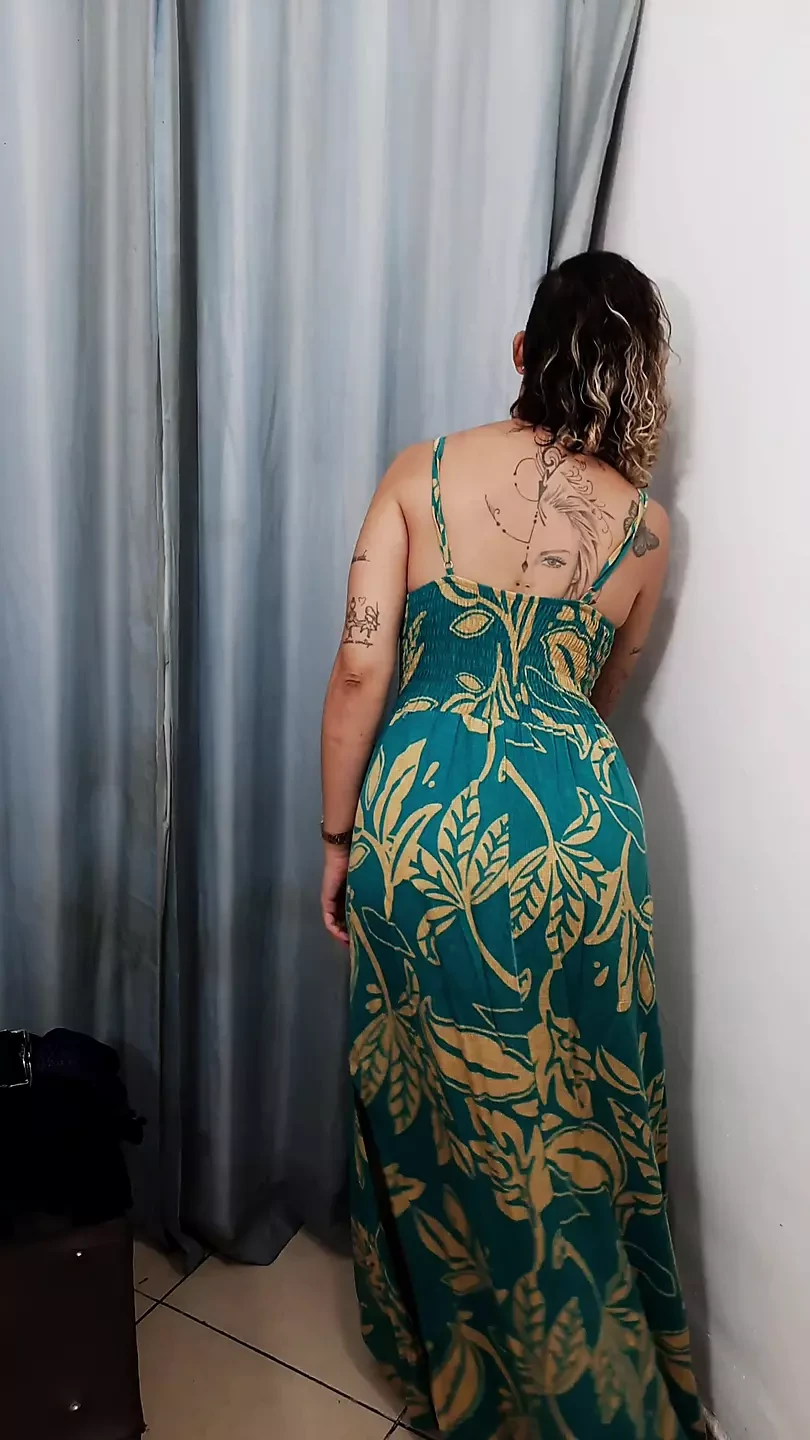 MILF has sex with a salesman in the dressing room.