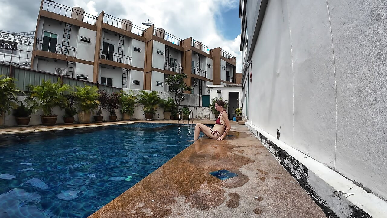 watch us playing in our swimming pool