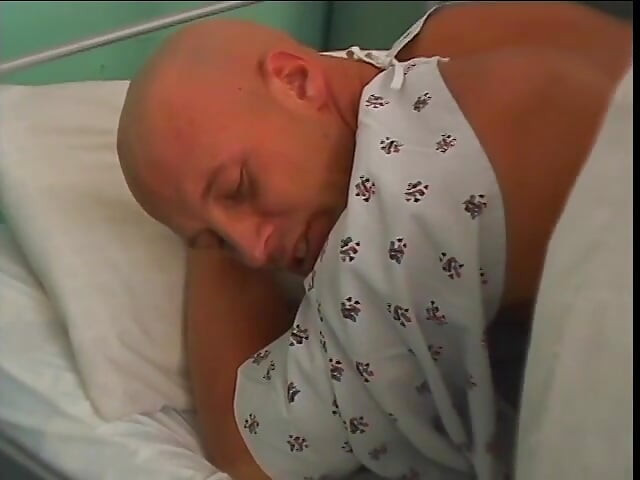 Hot blonde nurse sticks a thermometer in guy's ass in operation room