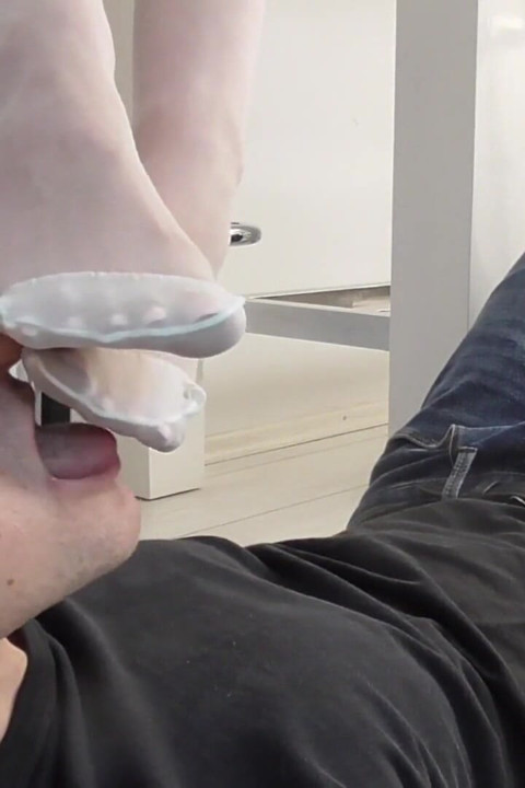 Princess Kirstin let her white stocking feet lick and kiss by her slave Bobby.