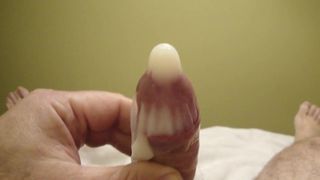 A very huge cum shot in a condom.