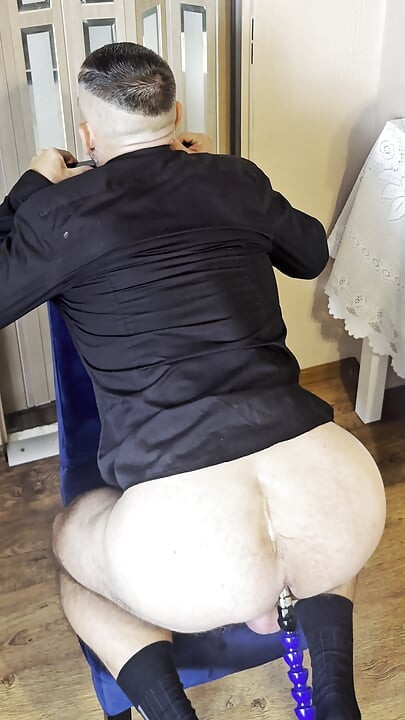 Businessman Gets Fucked by a Sex Machine and Cums in a Chastity Cage