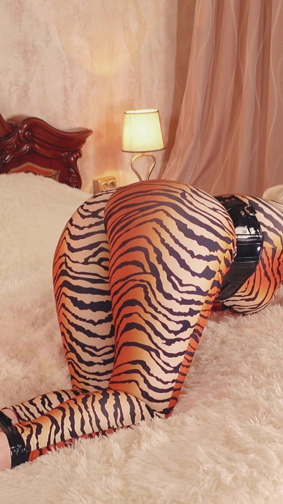 Submissive MILF gagged and bondage taped in spandex catsuit