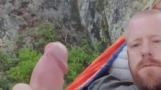 Stroking a beautiful cock in the beautiful outdoor