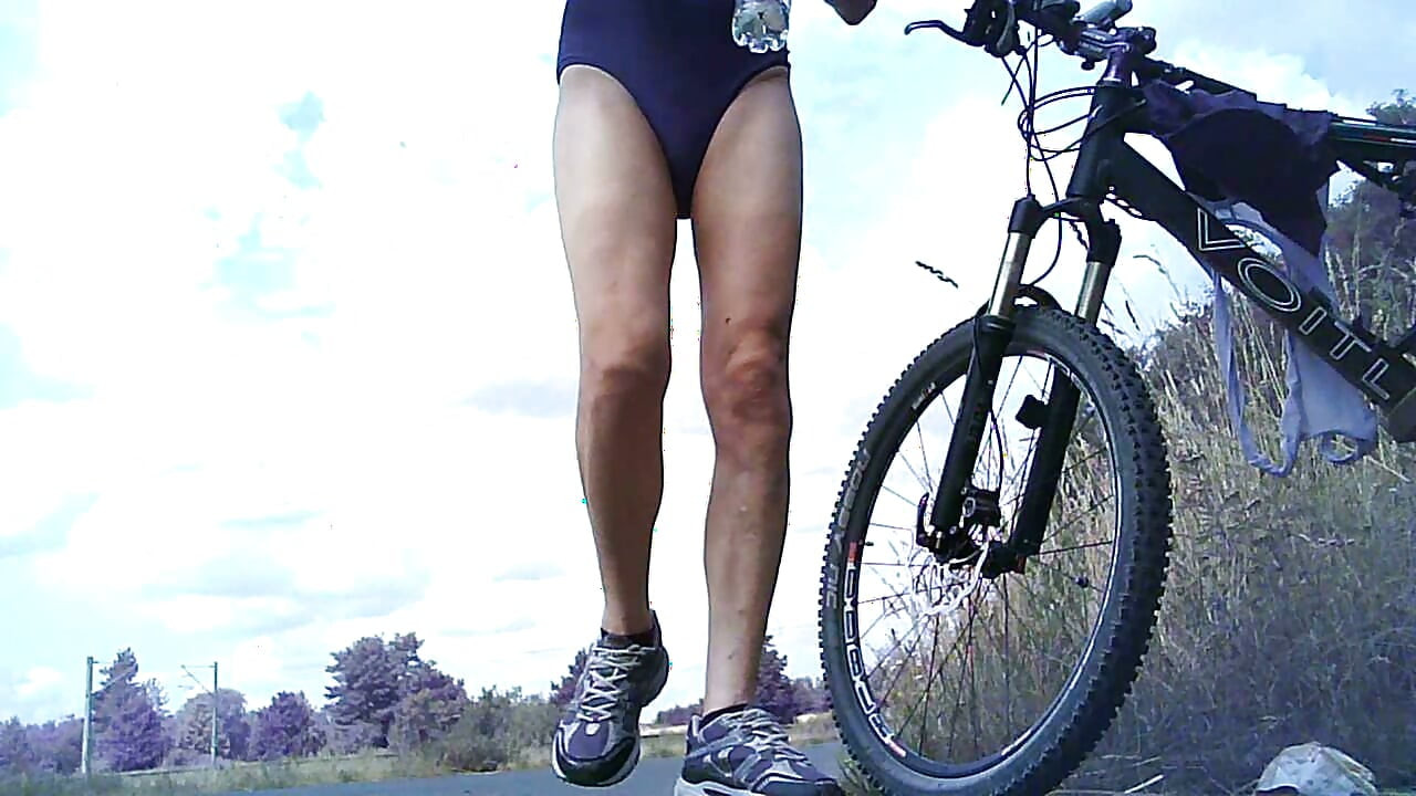 In a swimsuit on the bike