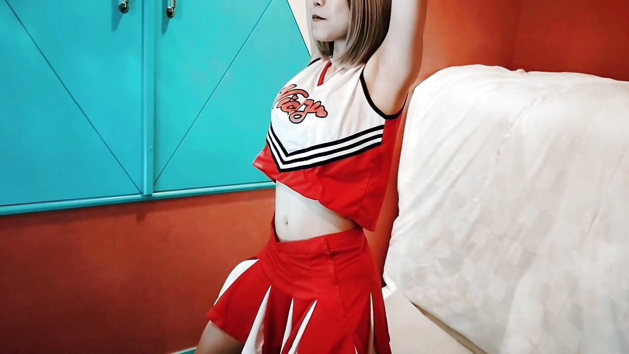 A cute busty married woman exercises 2 in a sexy cheerleader costume. Home made amateur Private Shoot