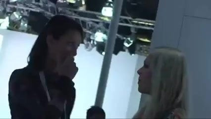 Two girls bare feet to the motor show