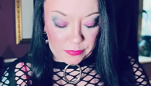 Pink & Delicious Tina Snua Sparks Up A Cigarette In A Holder