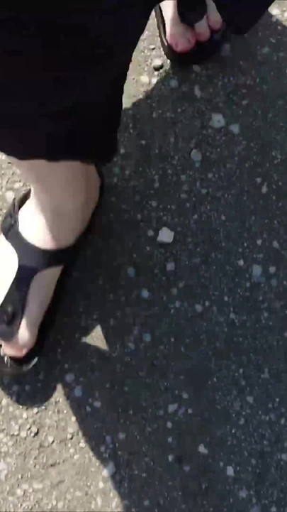 Outdoor in a Black Caftan and Barefoot in Black Birkenstocks