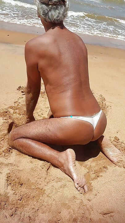 Ladysilva on the beach in sexy panties tanning her hot ass