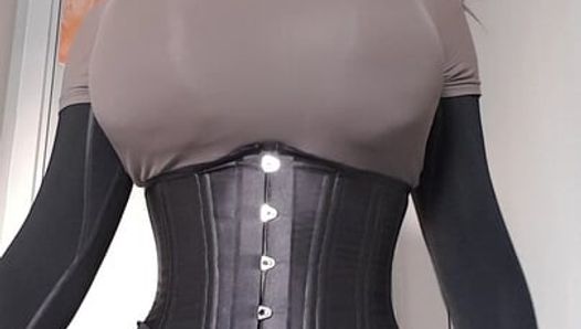 Big tittied hooded sissy slut in tight corset