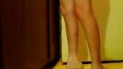 Naked sissy with long slim legs in heels