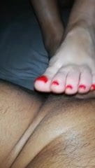 A little pampering with his mistress's feet