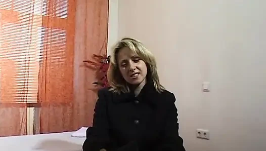 Busty blonde showing her body