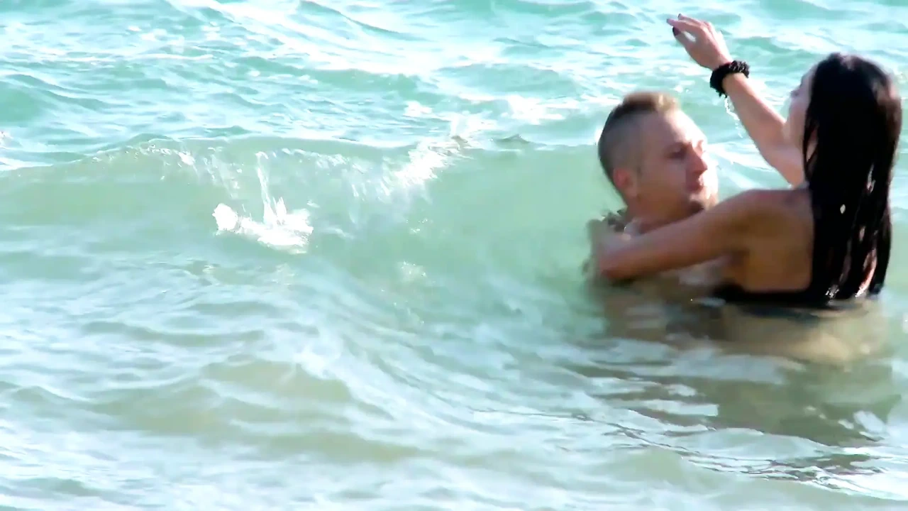 Brunette slut gets fucked doggystyle on the beach