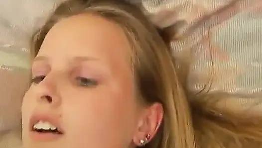 Lovely teen gets pussy drilled on the bed
