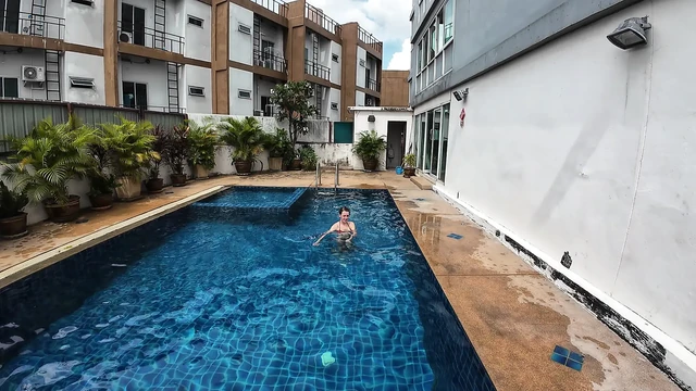 watch us playing in our swimming pool