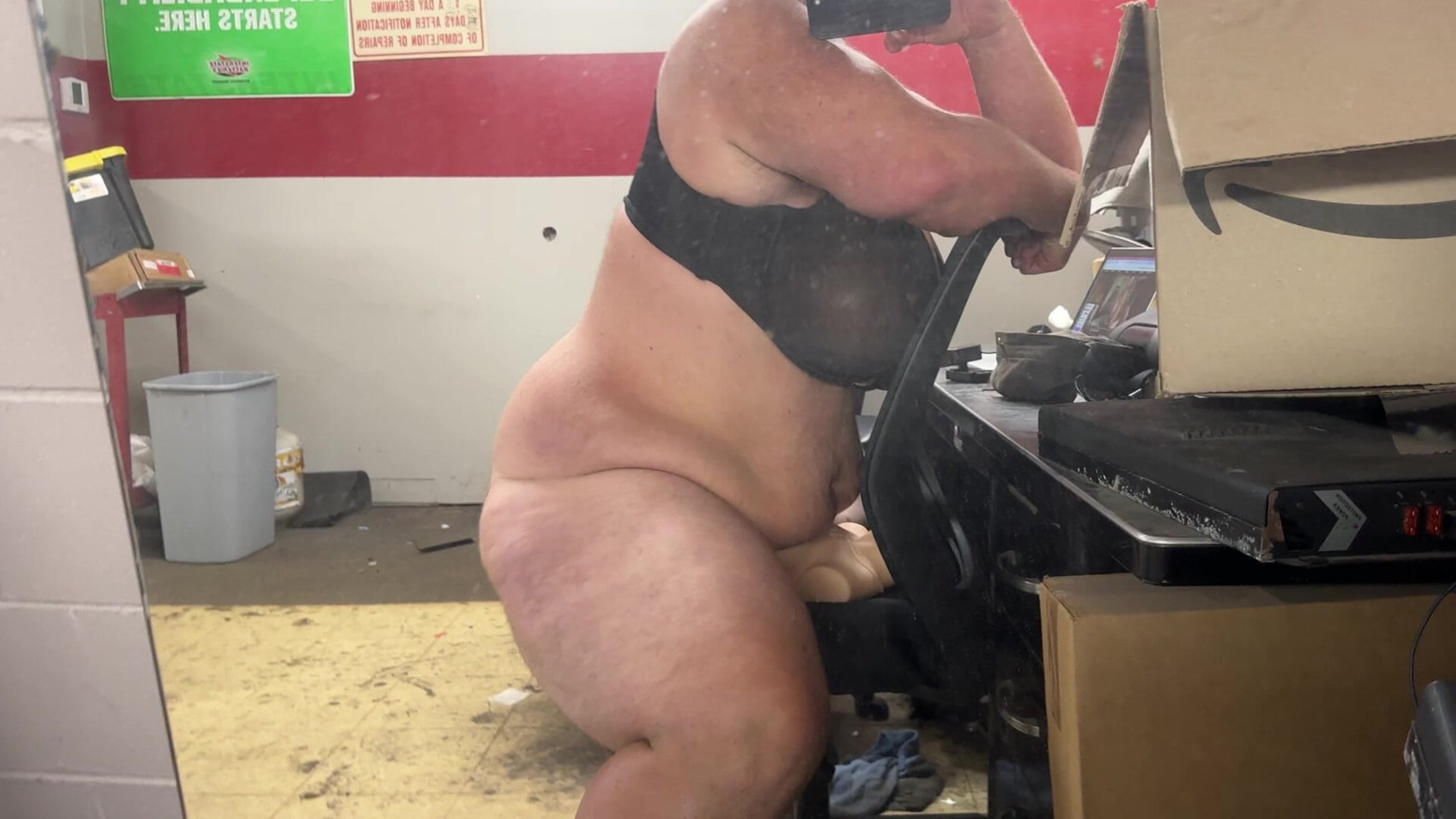 Big bear Mechanic riding sex doll at work in bar with huge tits
