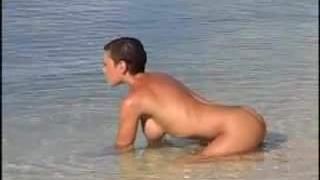 Naked pose beach photo shoot