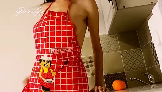 Hot housewife sexually rustles her apron in the kitchen