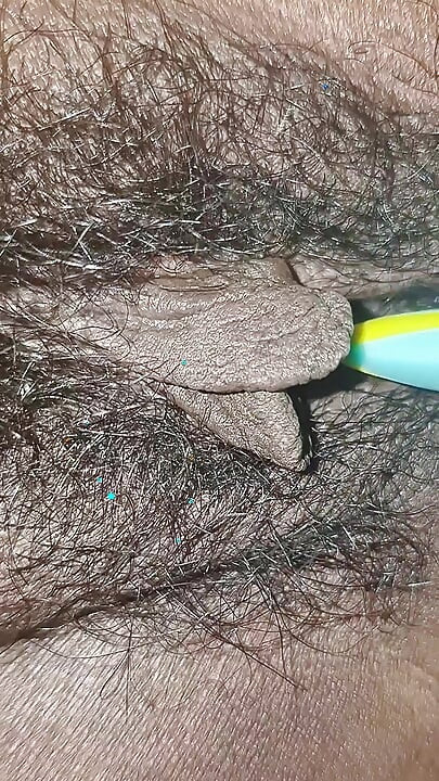 The village woman is showing her large pussy