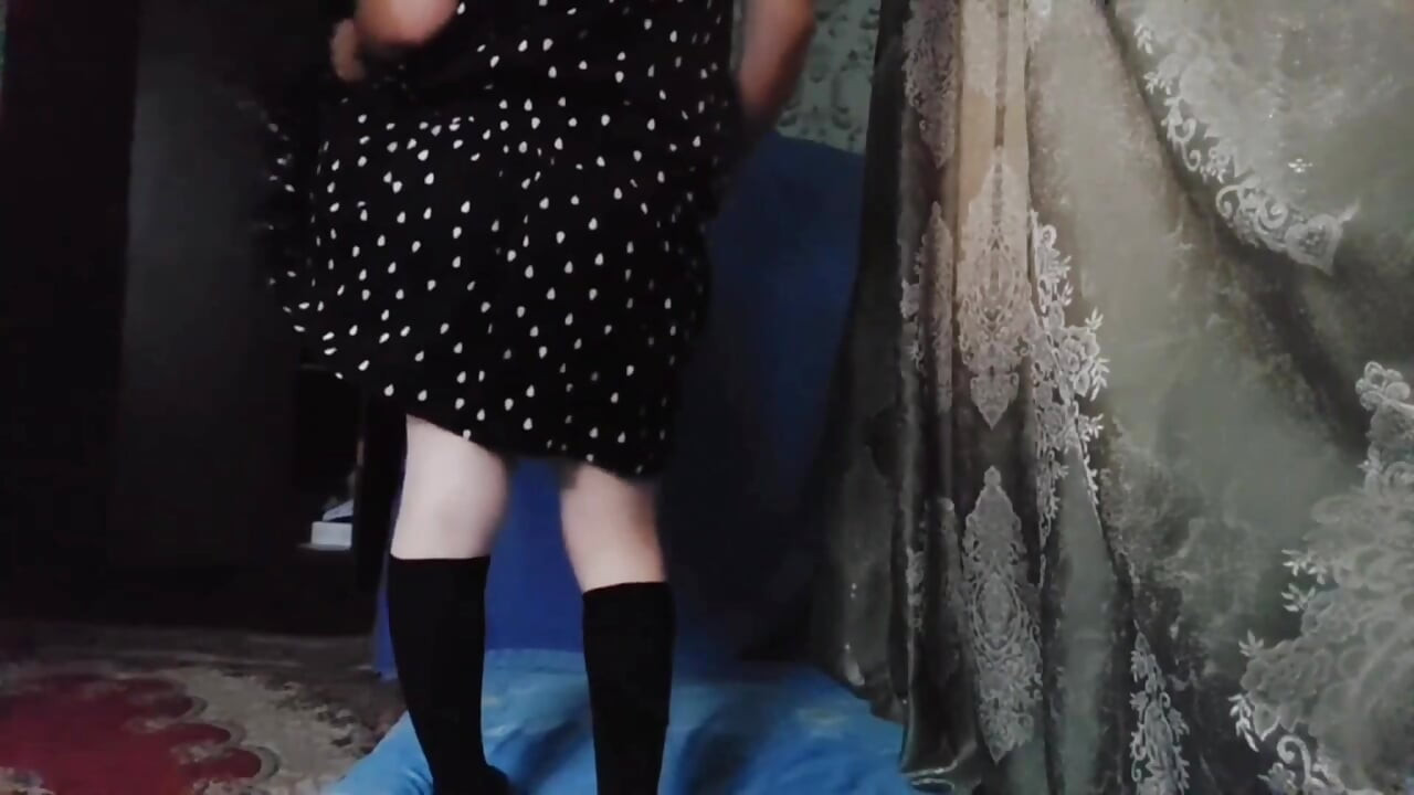 Playful trans girl trying on cute summer dress