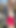 奴隷は目を引く赤いパンティー姿で現れ、服を完全に脱いで、長く伸びた乳首を見せます。