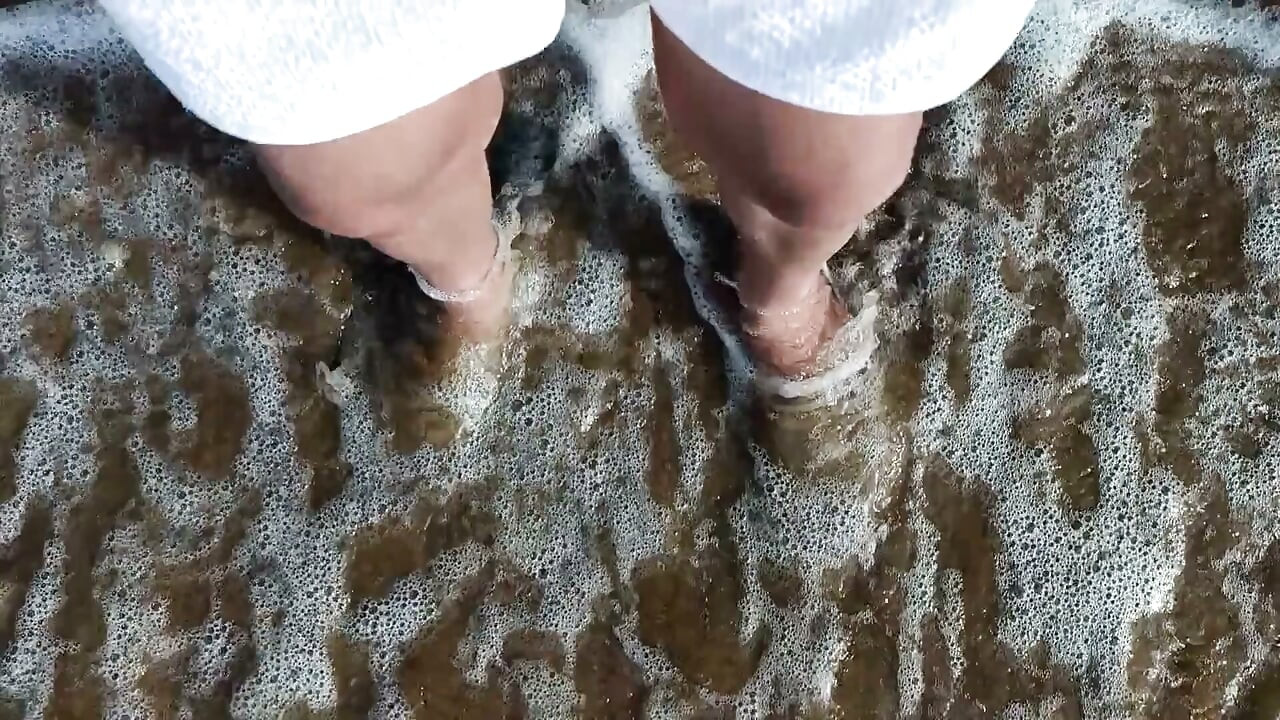 Feet and the Sea Extra Slowmotion - One Foot Barefoot and Foot in Slide - Great Feet in Sea