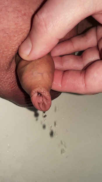 Memorable moment from "play with the foreskin of my micro cock while peeing"