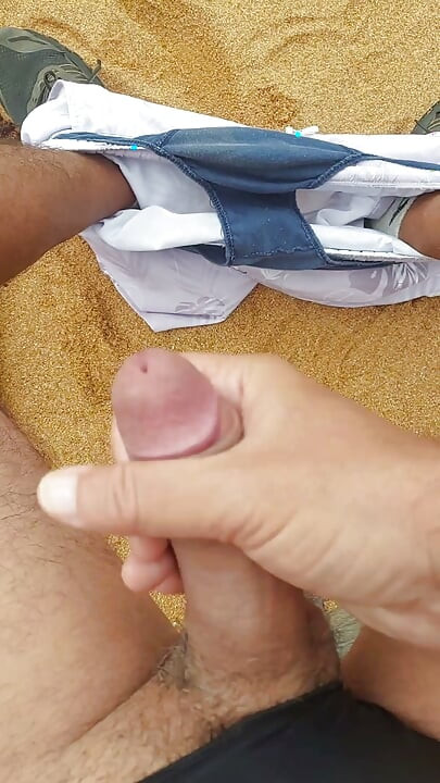 Ladysilva masturbating his cock on a deserted beach until he cums hot