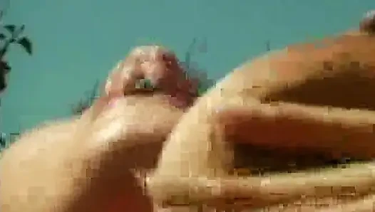 Tempting babes sharing big dildo poolside