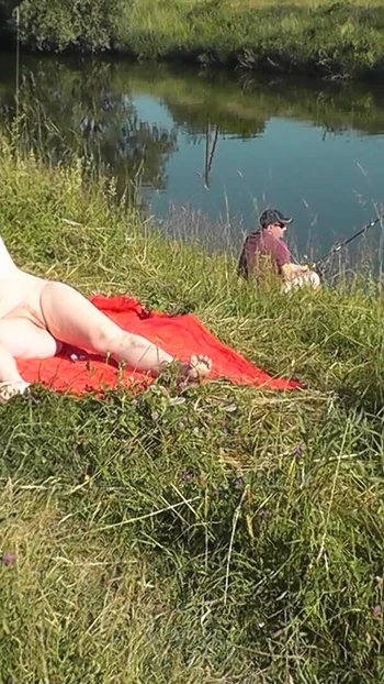 Iconic moment from "Nudist beach. Public nudity. Sexy MILF without panties and bra sunbathes naked is not shy about"