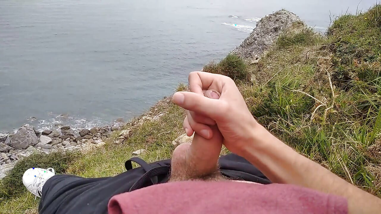 Big Beautiful Big Fat Cock Gets Handjob on the Beach with Gorgeous Sea Views