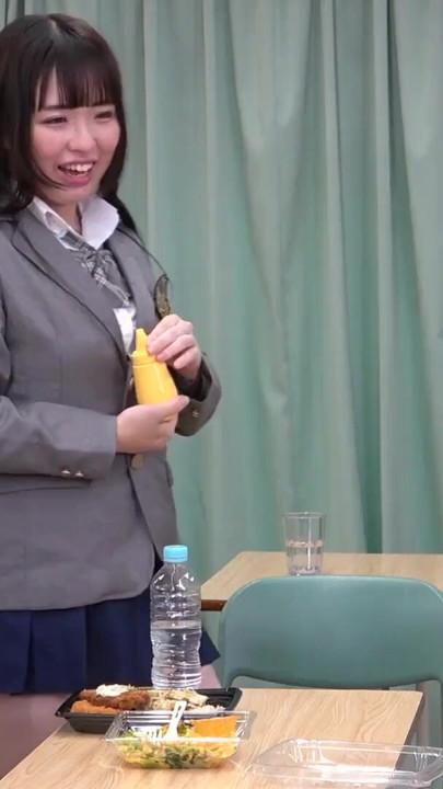 Japanese girl in a miniskirt uniform spits on a masochist's lunch box and plays with it | Clip 1