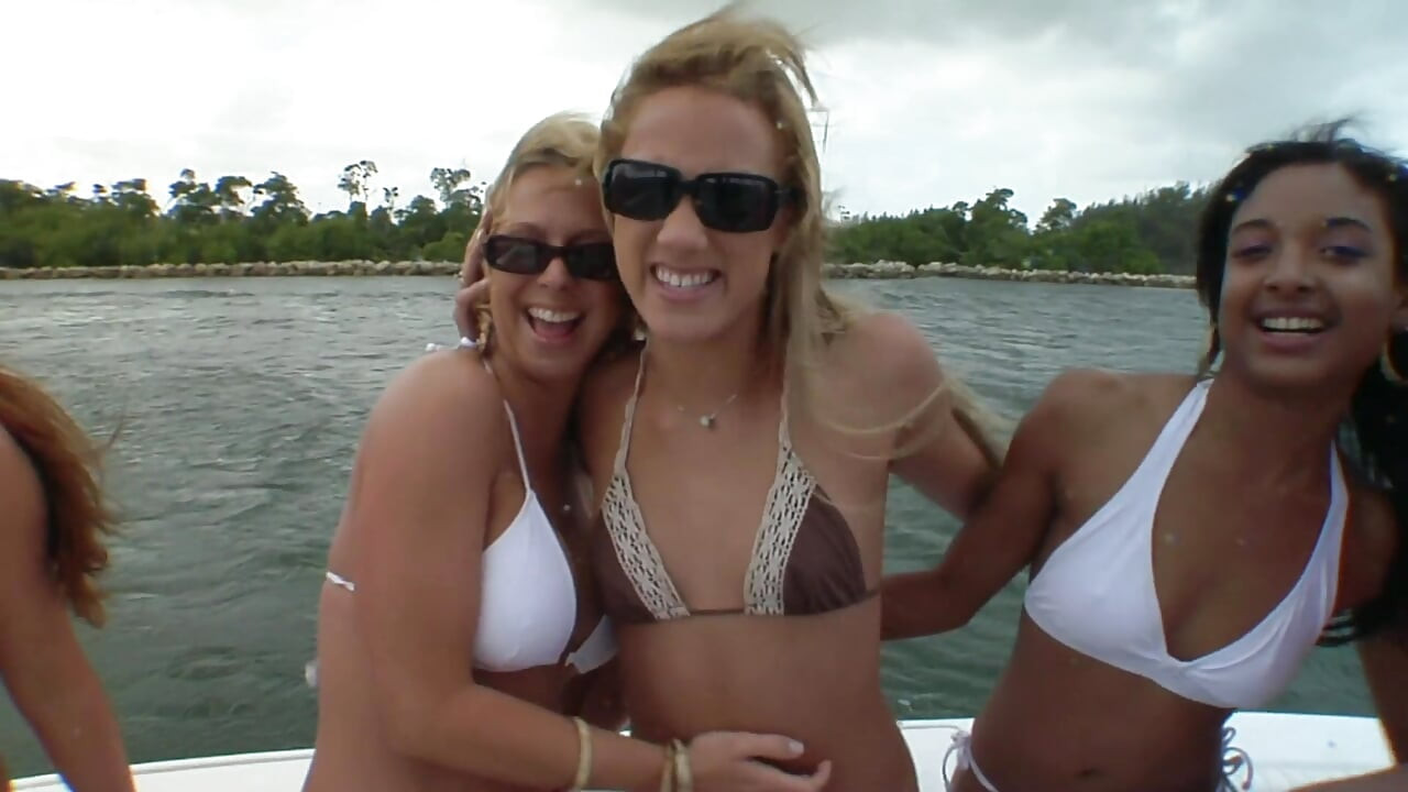 Horny lesbians touching each other on the boat