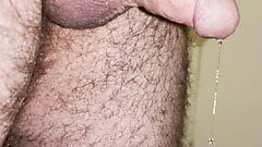 Precum just keeps dripping and oozing out of my cock head as I taste some from time to time and enjoy the sweet taste