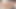 Vollbusige schönheiten in bikinis ölen sich gegenseitig ein, bevor sie sich gegenseitig essen