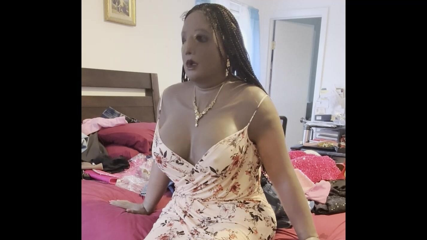 Danae shaking and spinning her breasts.