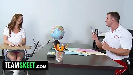 Sexy brunette spreads her legs wide in detention