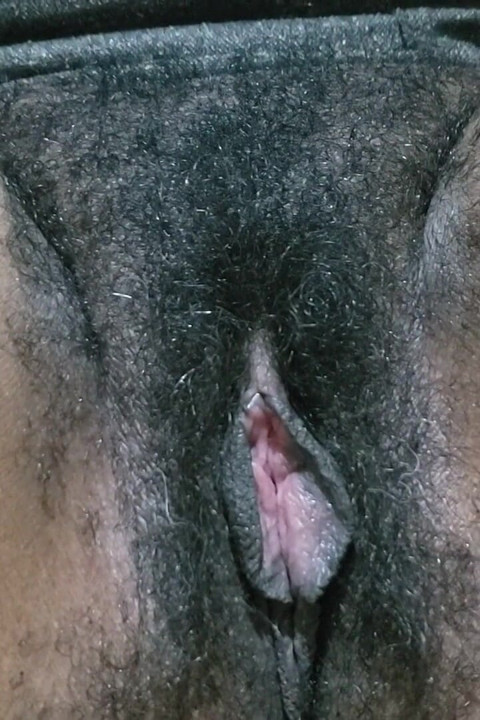 A Woman with Hairy Pussy in Her Secretary Outfit
