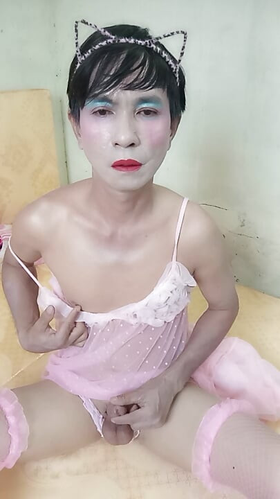 Oanh Le transgender wearing a sexy robe masturbating happily