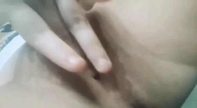 Girl masturbates pussy
