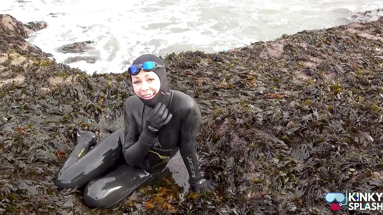 Rubbery Beach Encounter: Lucy's Neoprene Pussy Play with Stranger