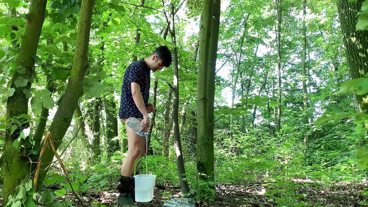 Balls Stretching Outdoor with Bucket Filled with Water and Jerk off