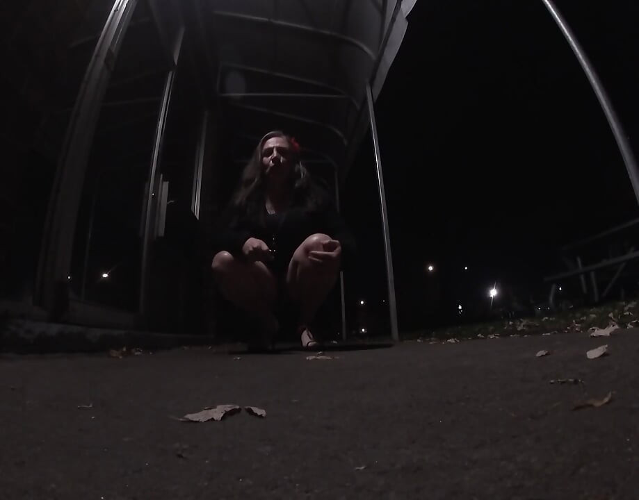 Transvestite Sissy whore is out and about at night .