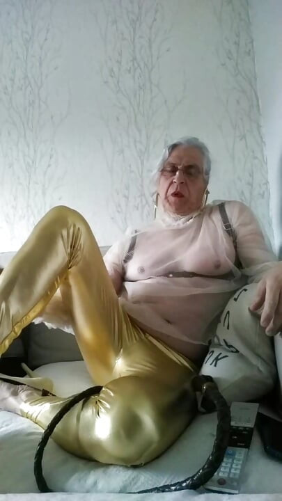 Whore in Leggings with a Whip
