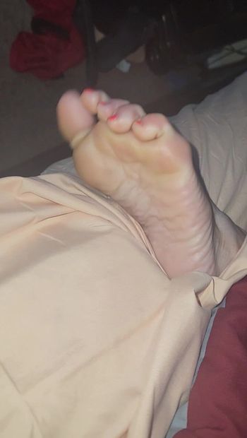 Daddy just caught a peek of my morning feets so I teased him a little with my toes.