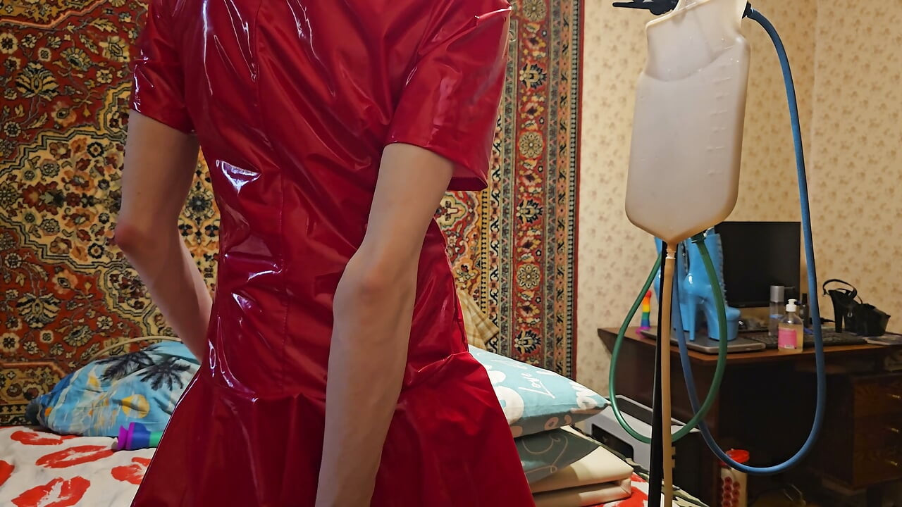 Sissy in fetish pvc dress water enema bag self punishment