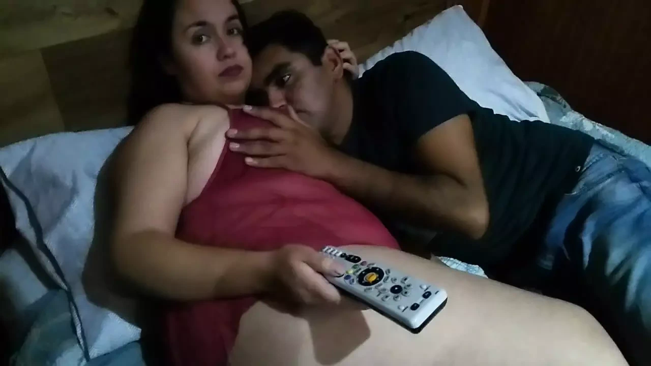 Stepmom and stepson are watching a movie but my stepson’s big dick gets hard